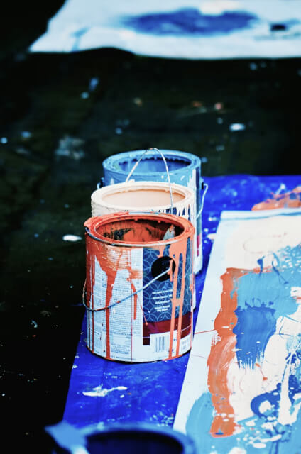 Photo of paint buckets used by UCAN to repaint the Garden Place Academy playground