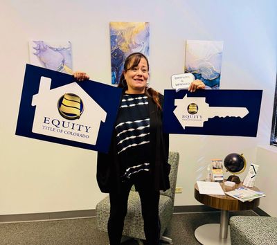 Woman in Denver closing on a house purchase